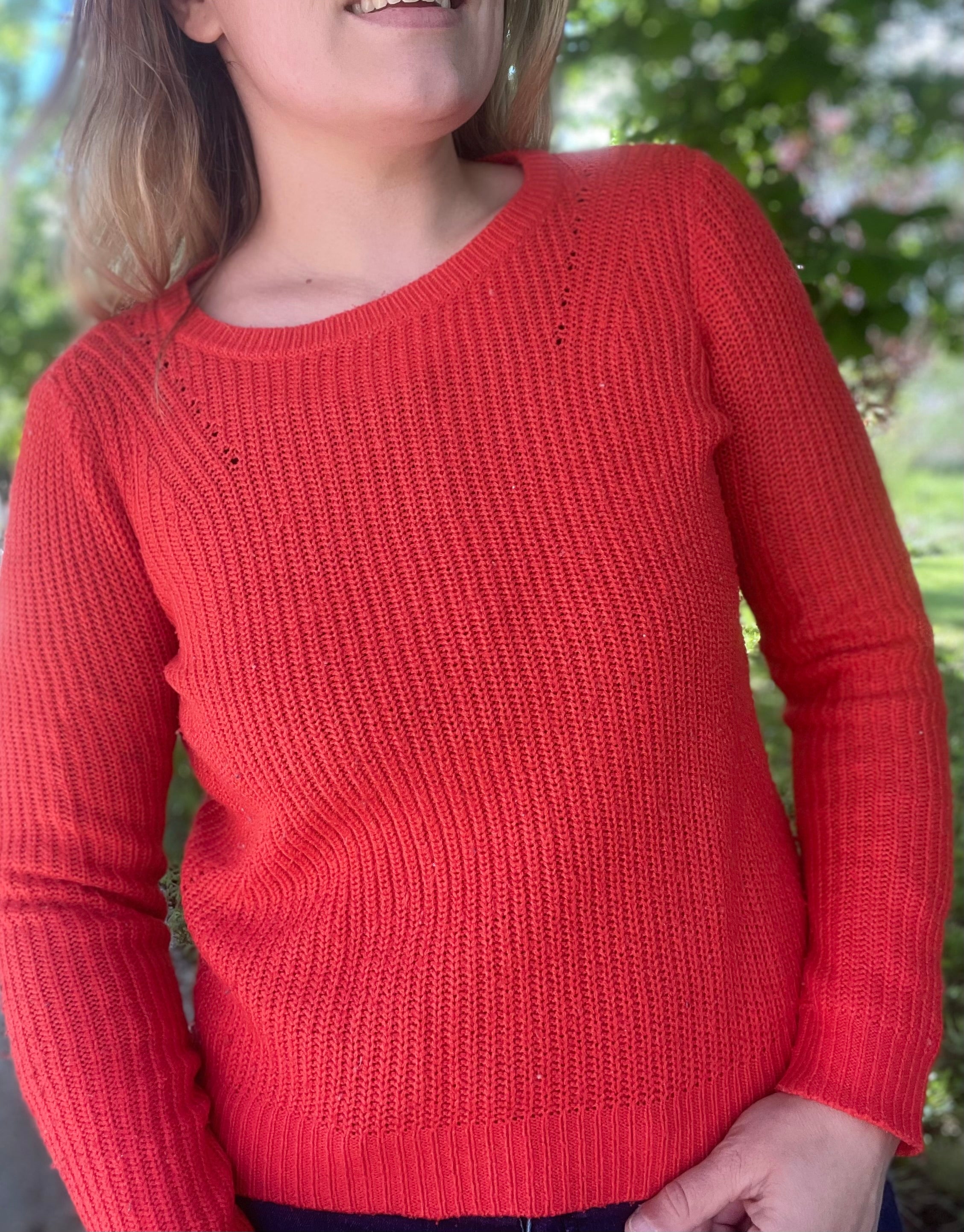 Pull orange lumineux