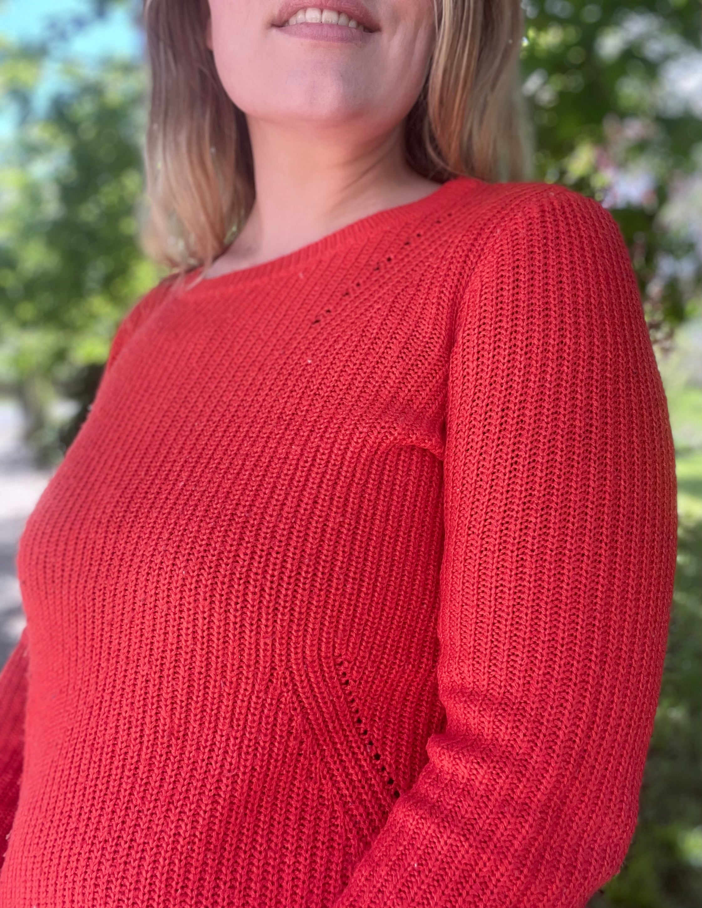 Pull orange lumineux